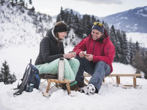 Pause auf dem Rodel