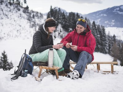 Pause auf dem Rodel