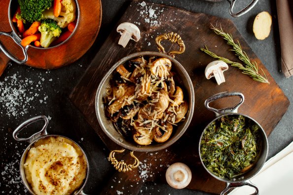 -top-view-pans-with-mushroom-sautee-mashed-potato-sabzi-boiled-vegetables-roasted-potatoes b