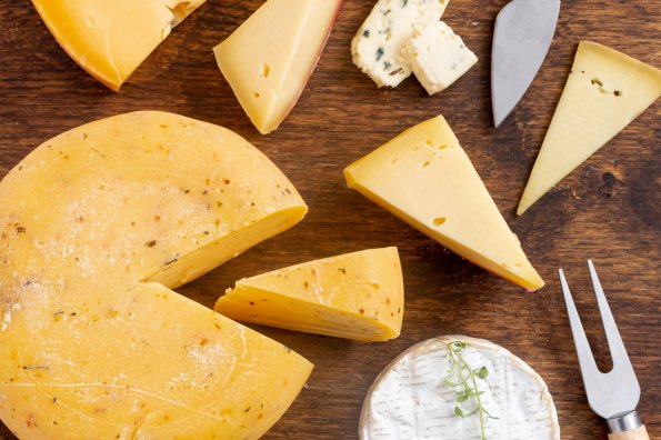 -top-view-mature-cheeses-table b