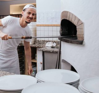 Unsere Pizzeria in Toblach bietet italienische Schmankerln
