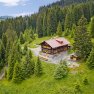 Die Wannenkopfhütte bei Oberstdorf ist eine urige Allgäuer Berghütte mit traumhaftem Blick auf die Berge.
